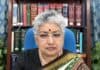 Justice B.V. Nagarathna Stresses Election Commission Independence to Safeguard Indian Democracy Woman with glasses in front of law books.